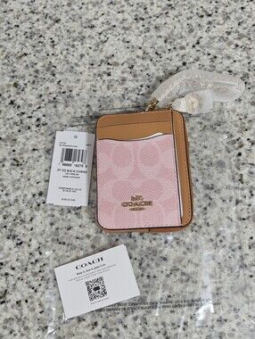 Coach Zip Card Case In Signature Canvas With Charm (Powder pink)